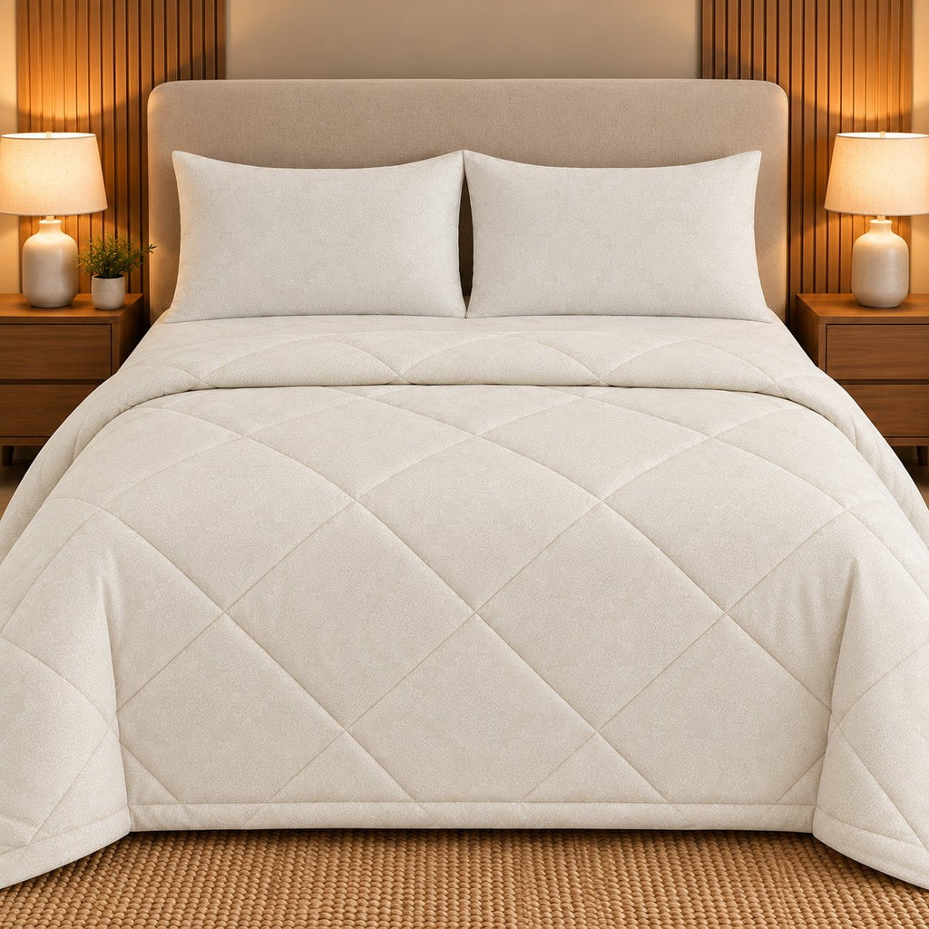 Ivory Embossed Sukoon Cotton Bed in a Bag by Reet (bed in a bag, comforter set with king bedsheet) — comforter on the bed