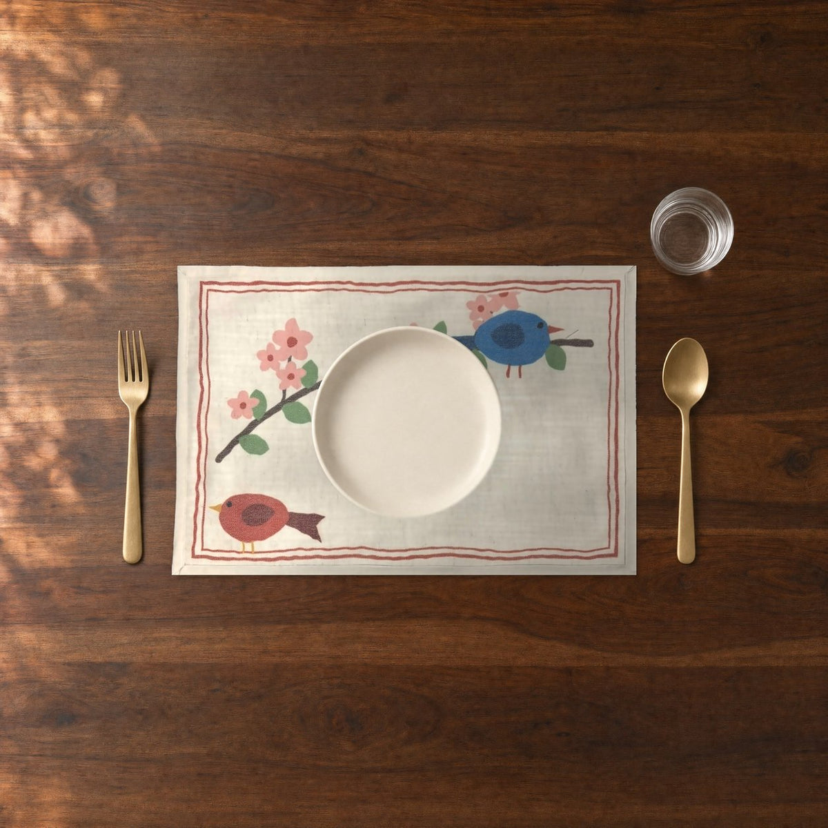 Blossom Branch (Ivory) placemats set of 6 by Reet (table mats, 12 x 18 in) — close-up of one place setting