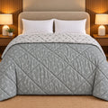 Sage Blossom Dohra Reversible Comforter by Reet (grey, sage green, off white, floral) — front side
