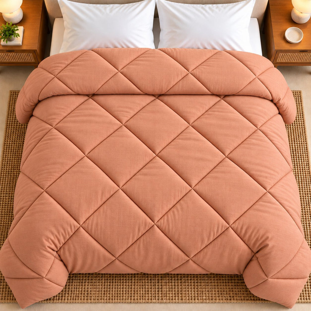 Peach Shir-o-Shakar Seersucker Comforter by Reet (peach seersucker AC comforter, light orange / pink, double bed 90x100) — top view