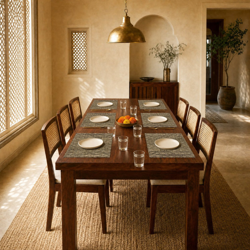 Mohur (Gold) placemats set of 6 by Reet (table mats, 12 x 18 in) — placemats on a dining table with plates